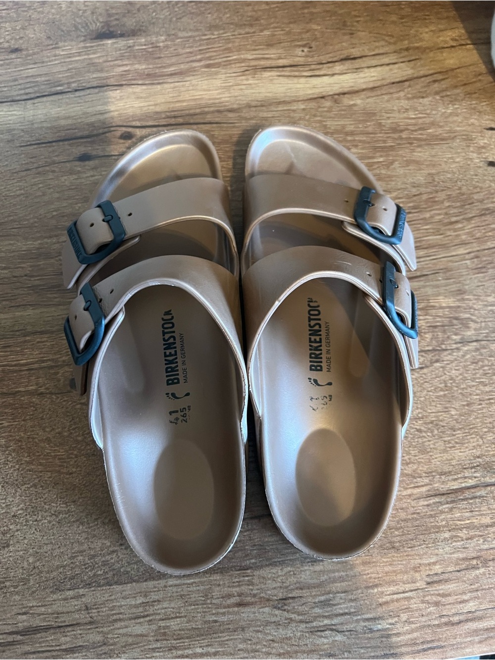 Birkenstock Arizona Stealth Buckle EVA Sandals in Metallic Tan w/ Black Buckles